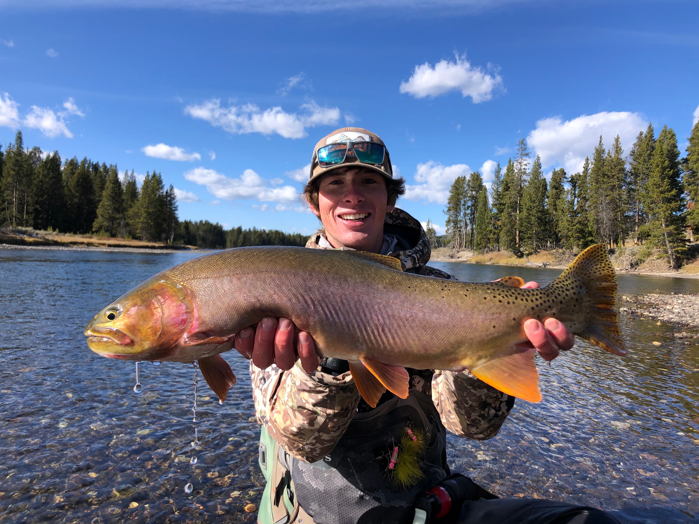 a person holding a fish